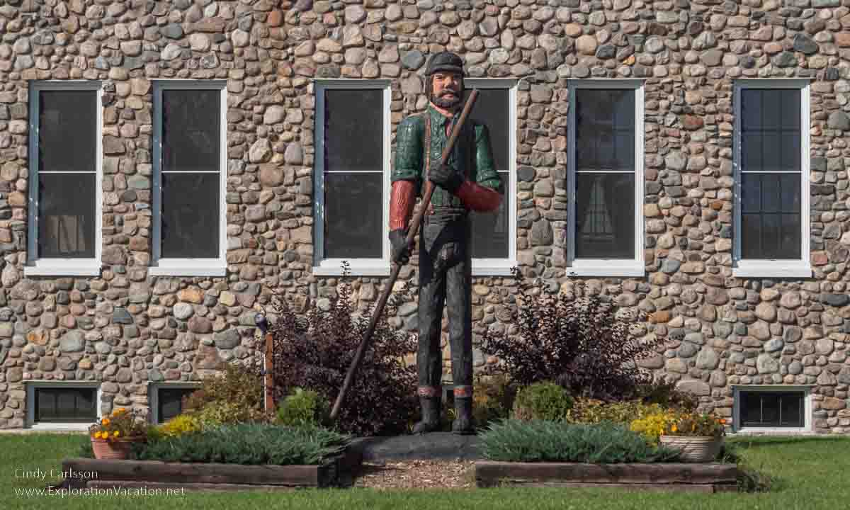 photo of lumberjack statue outside the historic Bigfork City Hall along Minnesota Highway 38, the Edge of the Woods National Scenic Byway &copy; Cindy Carlsson - ExplorationVacation.net