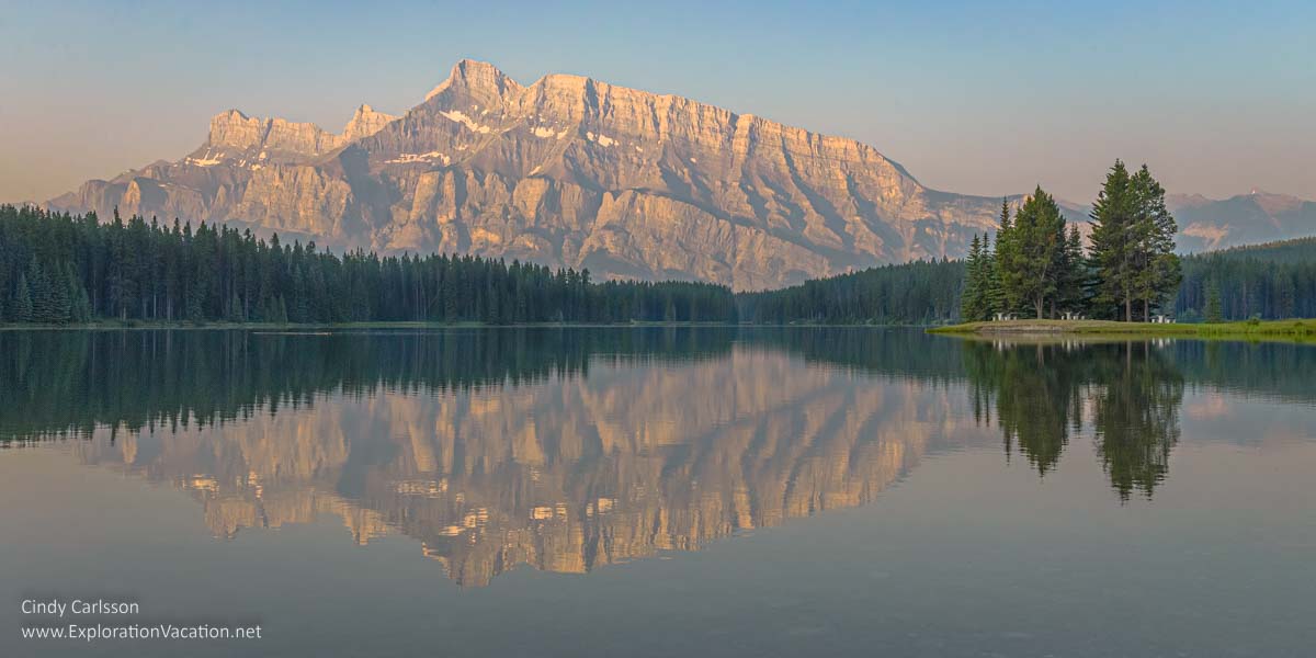 photo of Mount Rundle and Two Jacks Lake in Banff National Park, part of the Canadian Rocky Mountain Parks UNESCO World Heritage Site © Cindy Carlsson at ExplorationVacation.net