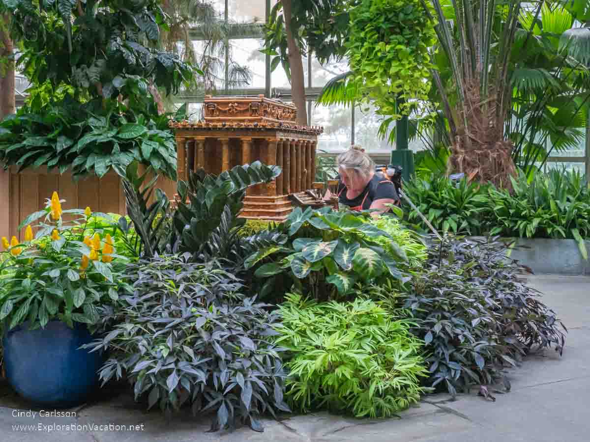 photo of a woman photographing a model of the Lincoln Memorial made out of plant material at the National Botanic Garden in Washington DC © Cindy Carlsson at ExplorationVacation.net