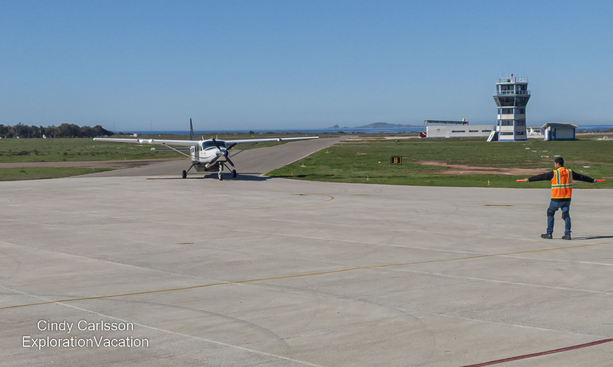 A small plane landing in Ensenada Mexico.