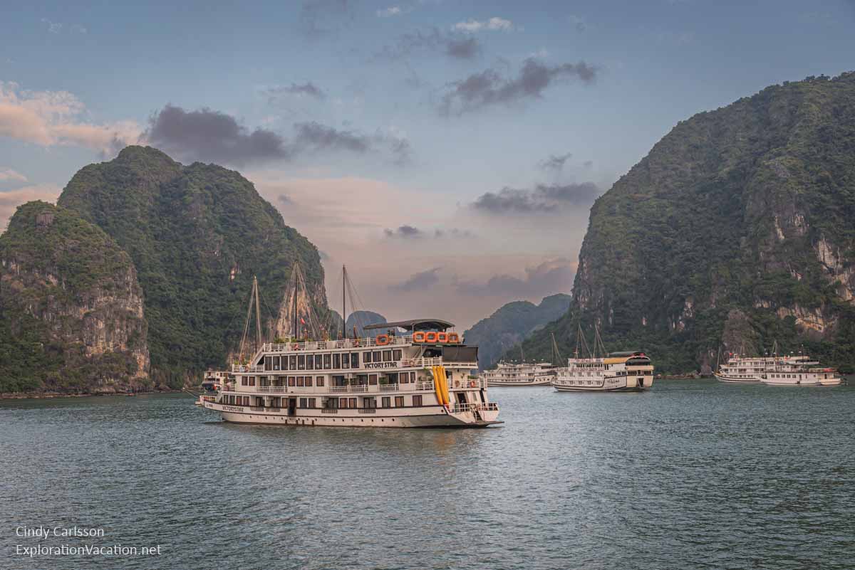 Photo of cruise ships in the Ha Long Bay UNESCO World Heritage site in Vietnam &copy; Cindy Carlsson at ExplorationVacation.net 