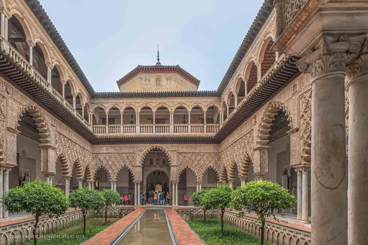 photo of an internal courtyard called the Courtyard of the Maidens in Seville Spain's Royal Alcazar &copy; Cindy Carlsson at ExplorationVacation.net 