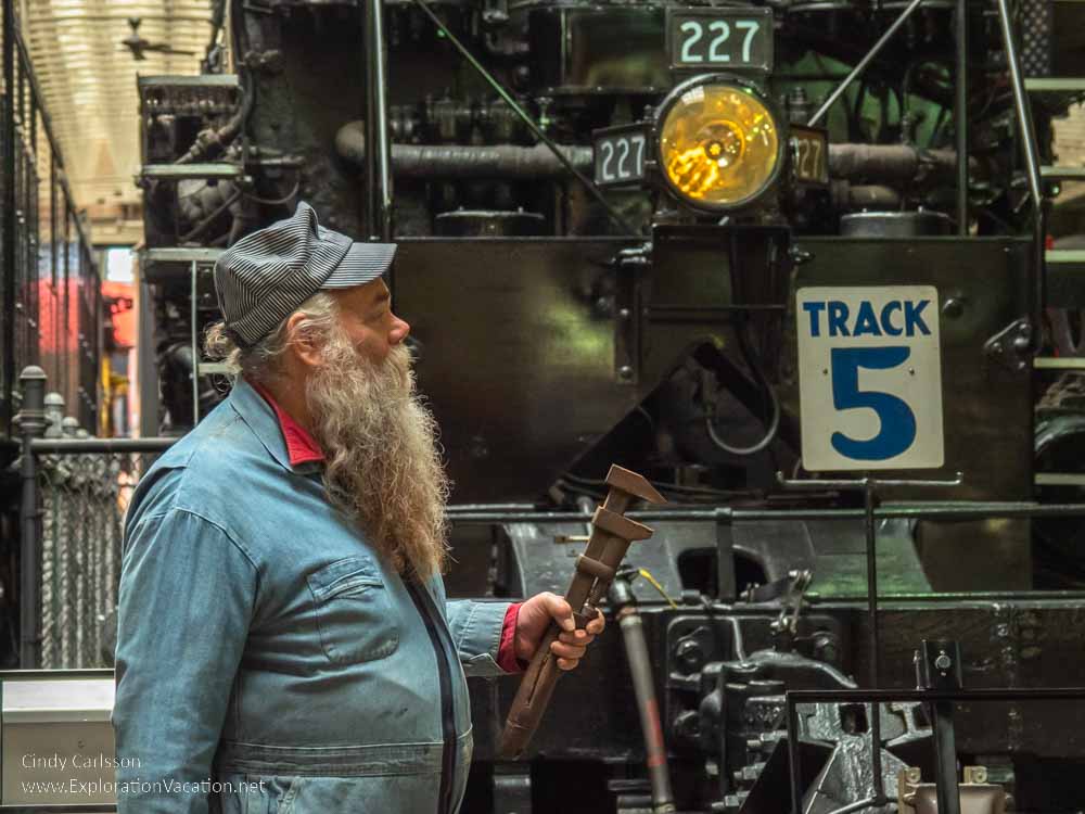 photo of a man dressed like a railroad worker at the Duluth Railroad Museum in the old Depot &copy; Cindy Carlsson at ExplorationVacation.net