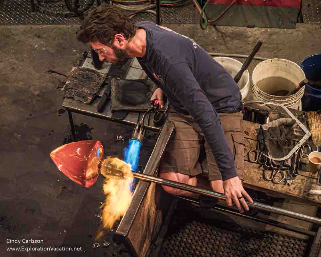 Photo of a man working on a piece of glass at the Museum of Glass in Tacoma, Washington &copy; Cindy Carlsson at ExplorationVacation.net