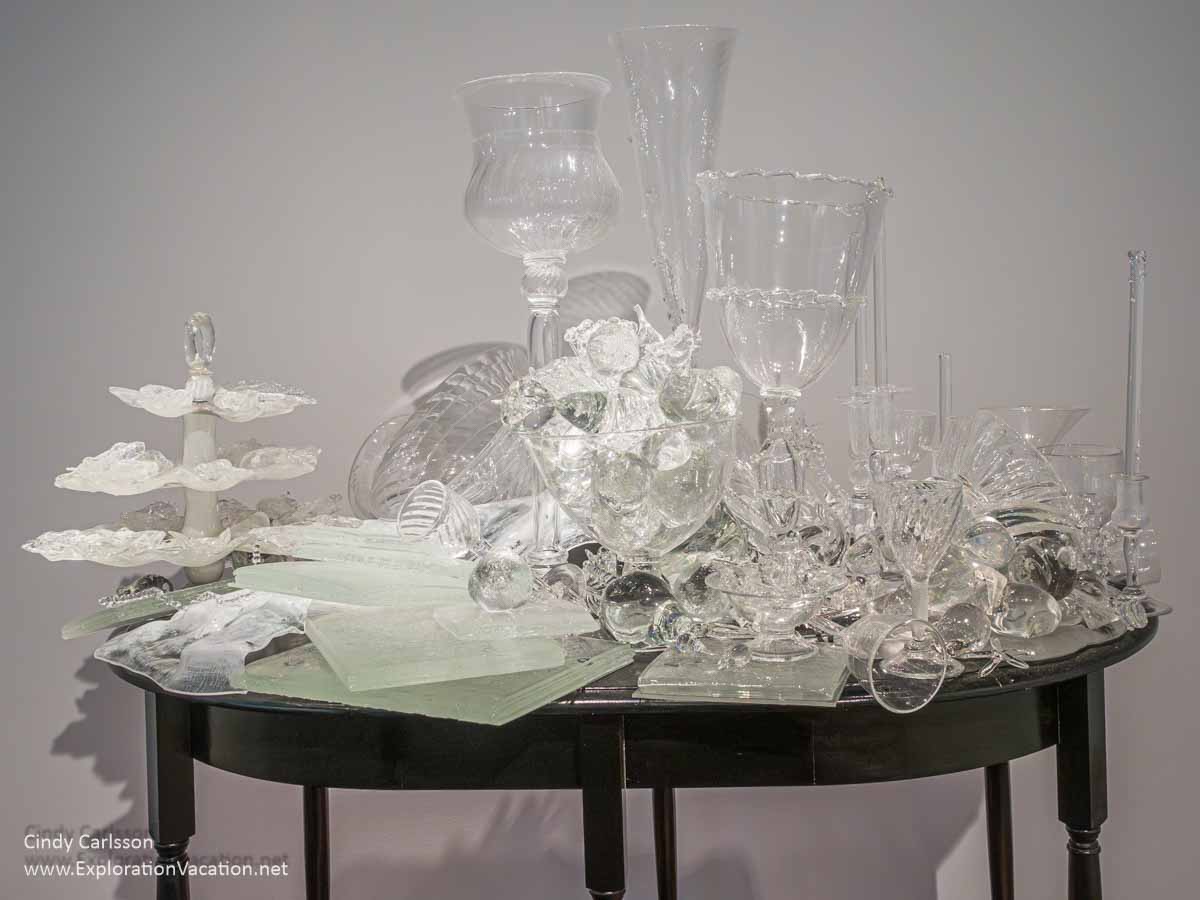 Photo of &ldquo;Oysters, Books, Fruit, and Candles&rdquo; by Beth Lipman at the Museum of Glass in Tacoma, Washington &copy; Cindy Carlsson at ExplorationVacation.net