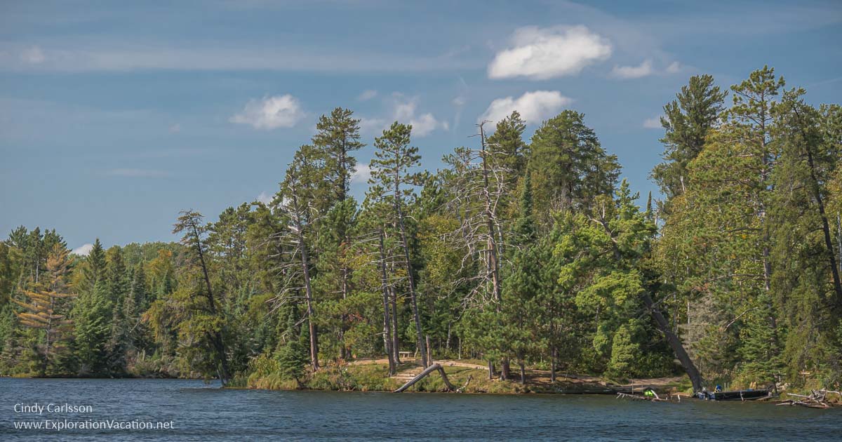 photo of a rocky forested shore in Minnesota's Bear Head Lake State Park © Cindy Carlsson at ExplorationVacation.net