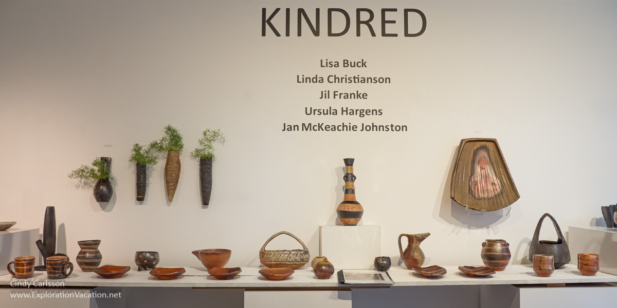 Photo of a pottery show featuring work by prominent female potters at the Raymond Avenue Gallery in St Paul Minnesota © Cindy Carlsson at ExplorationVacation.net
