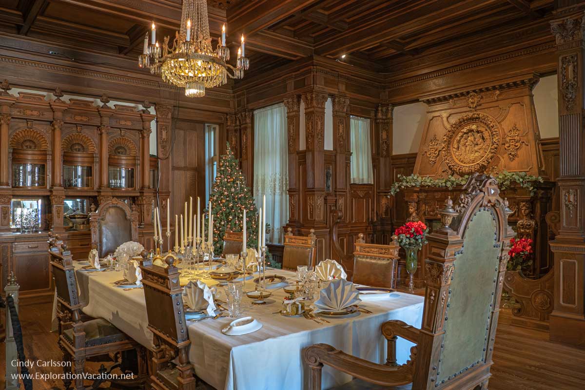 Photo of the dining table at the American Swedish Institute (ASI) in Minneapolis, Minnesota, set for a formal Christmas dinner in 2022 &copy; Cindy Carlsson at ExplorationVacation.net