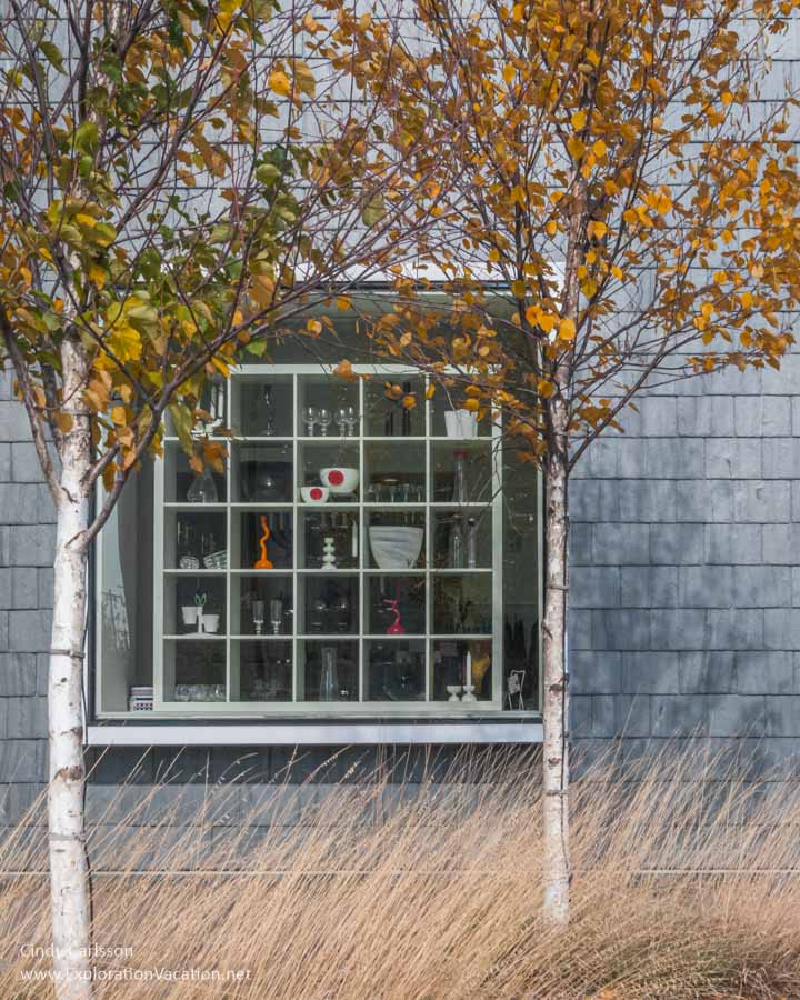 Photo of a shop window filled with Nordic glass and other objects at the American Swedish Institute (ASI) in Minneapolis, Minnesota &copy; Cindy Carlsson at ExplorationVacation.net
