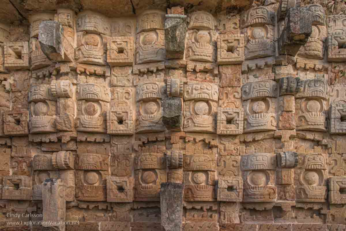 photo of a wall of interlocking faces call the Codz Poop at Kabah, Mexico, part of the Pre-Hispanic Town of Uxmal World Heritage Site &copy; Cindy Carlsson at ExplorationVacation.net
