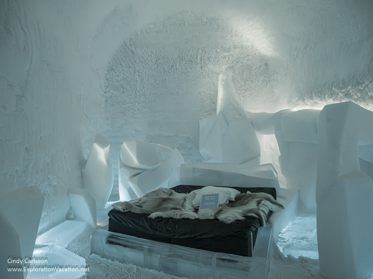 Photo of a bed surrounded by angular pillars and other forms in The Drift suite designed by Friederik Schroth and Fabien Champeval for Icehotel 365 in Jukkasj&auml;rvi, Swedish S&aacute;pmi (Lapland) &copy; Cindy Carlsson ExplorationVacation.net