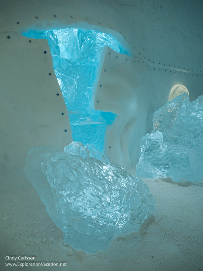 Photo of what looks a bit like the interior of a ship&rsquo;s hull with ice protruding through it in The Breach suite designed by Annie Locke Scherer and Tobias Kiefe in Icehotel 365 in Jukkasj&auml;rvi, Swedish S&aacute;pmi (Lapland) &copy; Cindy Carlsson ExplorationVacation.net
