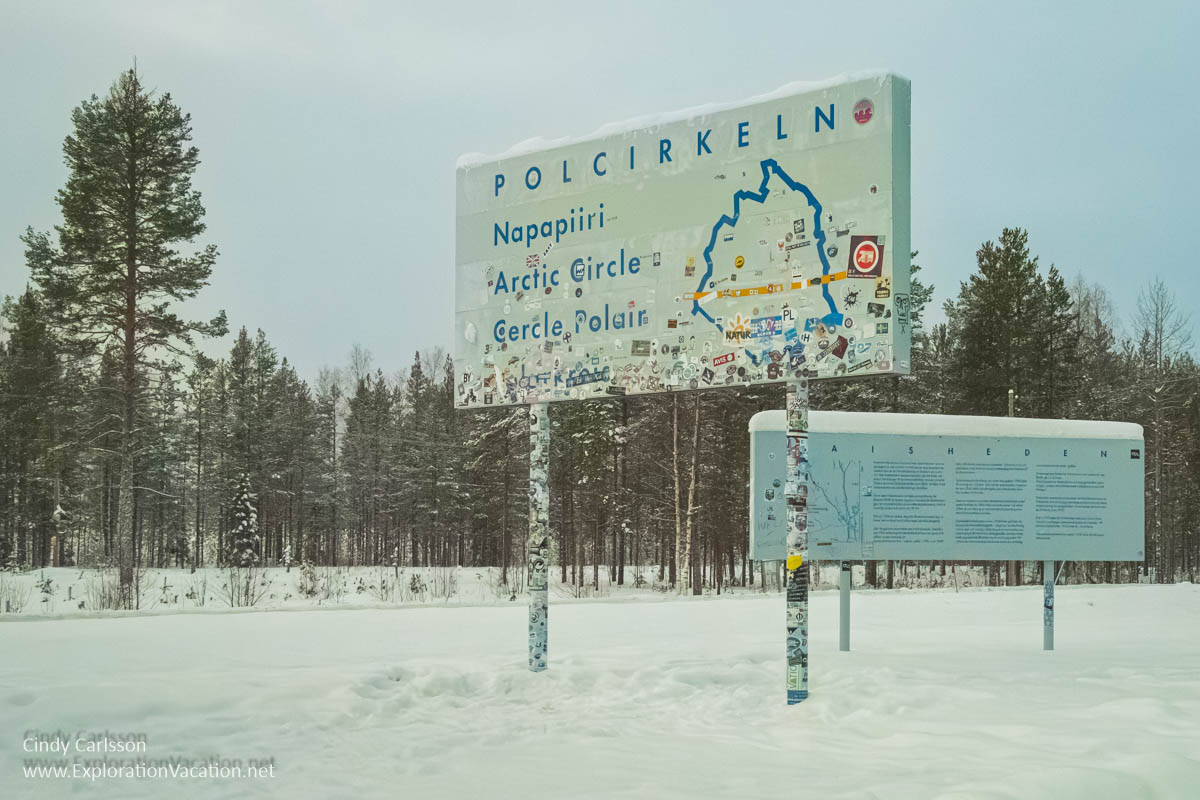 Photo of a road sign marking the Arctic Circle in Swedish S&aacute;pmi (Lapland) &copy; Cindy Carlsson ExplorationVacation.net 