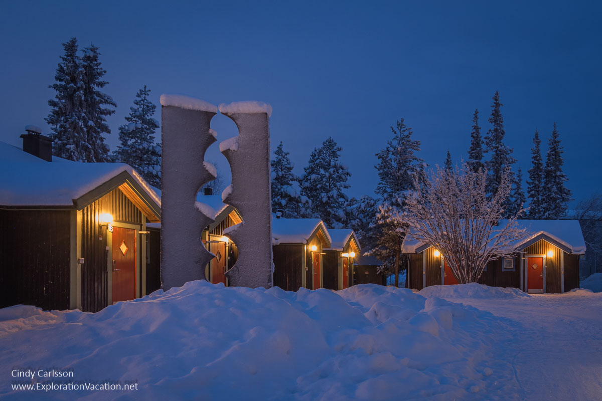 Winter photo of chalets at night at Icehotel in Jukkasj&auml;rvi, Swedish S&aacute;pmi (Lapland).