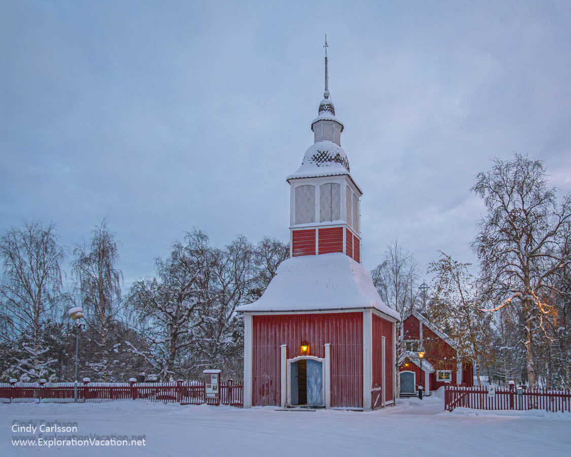 Winter photo of the Jukkasj&auml;rvi Belfry and Church in Swedish S&aacute;pmi (Lapland) &copy; Cindy Carlsson ExplorationVacation.net