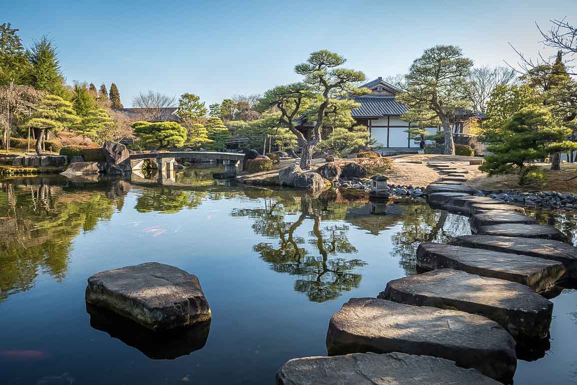 Photo of a large pond and Edo-style buildings in Koko-en garden in Himeji Japan &copy; Giulia Verdinelli