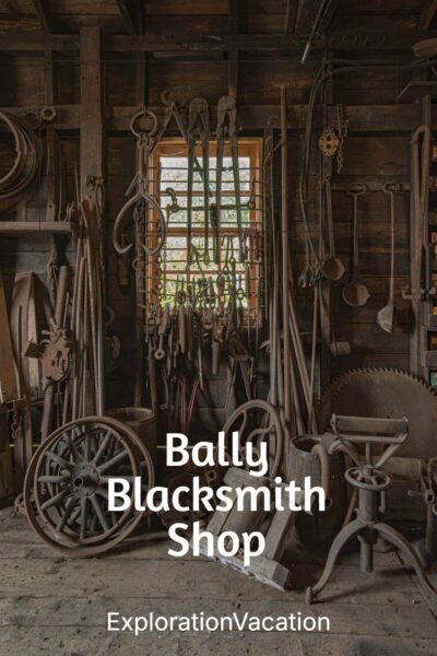 Interior of the blacksmith shop with tools and equipment piled everywhere.