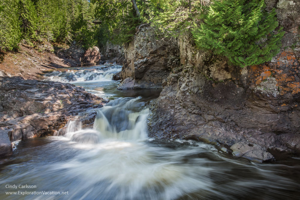 Rushing stream with small waterfalls in Cascade River State Park.