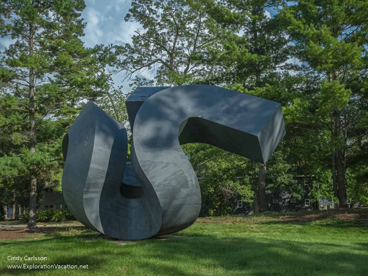 Photo of an outdoor sculpture by Clement Meadmore called “However” at the Dennos Museum Center at Northwestern Michigan College in Traverse City, Michigan. (Photo © Cindy Carlsson on ExplorationVacation.net)