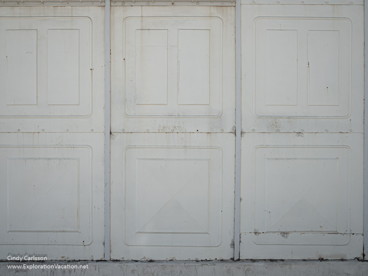 Detail of the white metal siding on the exterior of the Church of Santa Barbara.
