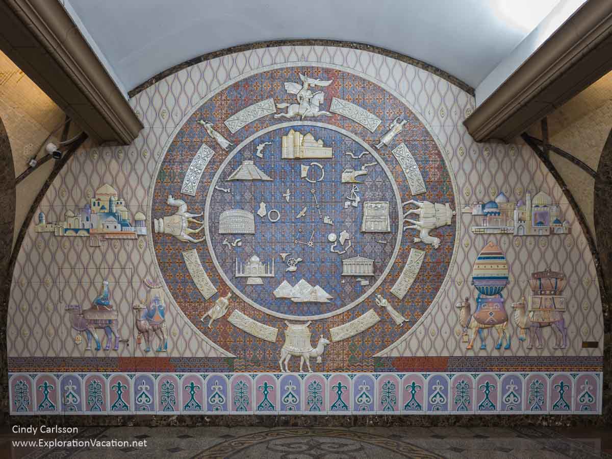 Photo of the round ceramic mural in the center hall at the Almaty Zhibek Zholy (Jibek Joli)/Жібек Жолы metro station in Kazakhstan. (Photo &copy; Cindy Carlsson on ExplorationVacation.net)