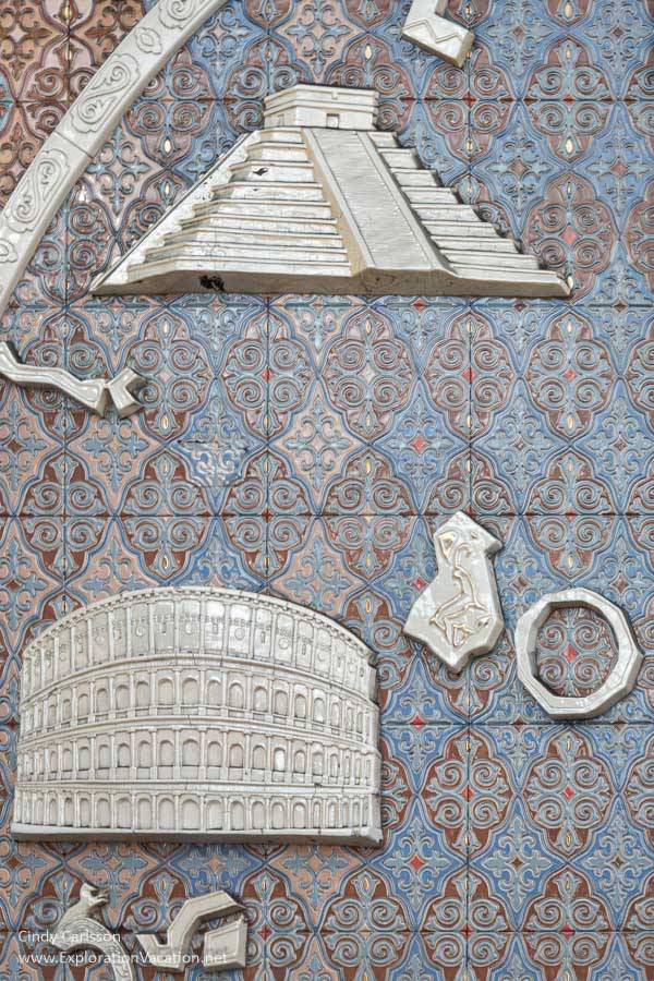 Photo of details from the round mural depicting Silk Road trade routes showing a Mexican temple and the Colosseum in Rome at the Almaty Zhibek Zholy (Jibek Joli)/Жібек Жолы metro station in Kazakhstan. (Photo &copy; Cindy Carlsson on ExplorationVacation.net)