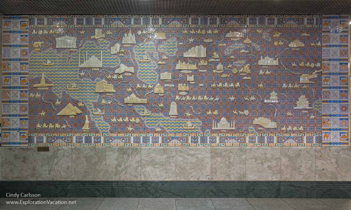 Photo of the rectangular ceramic mural depicting Silk Road trade routes at the Almaty Zhibek Zholy (Jibek Joli)/ Жібек Жолы metro station in Kazakhstan. (Photo &copy; Cindy Carlsson on ExplorationVacation.net)