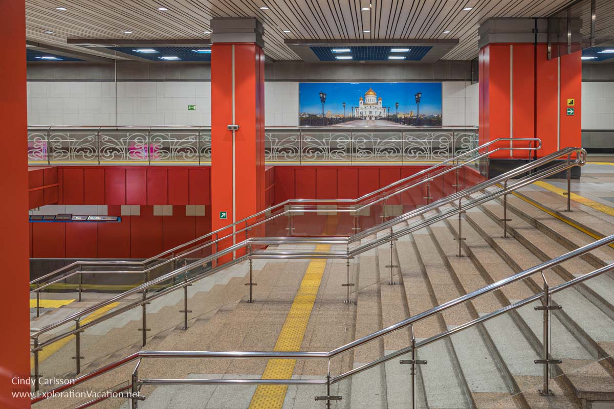 Stairs, pillars, and a photograph of Moscow.