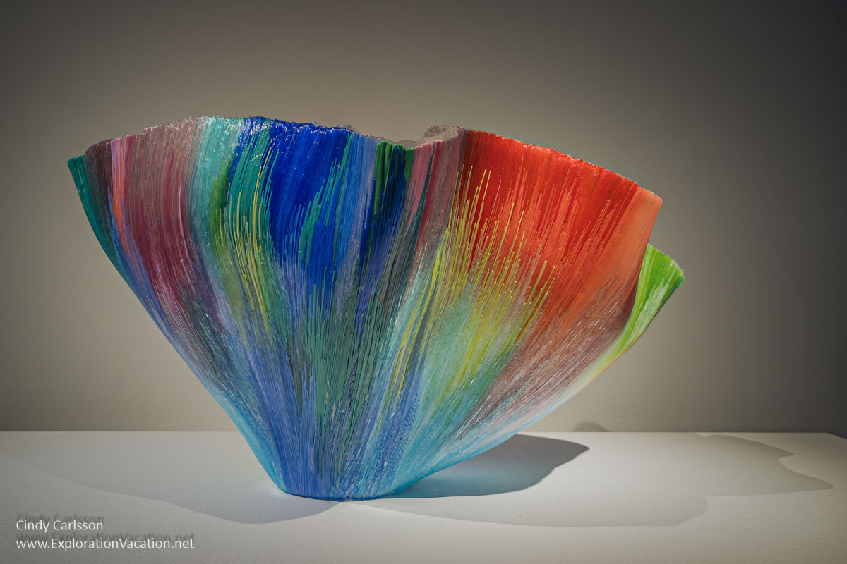 A multicolored bowl made from thousands of fused glass threads by Toots Zynsky.