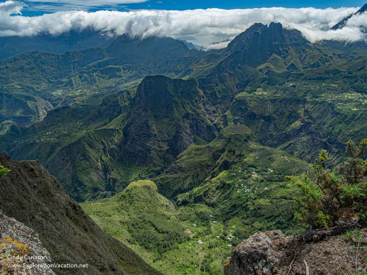 View into a high mountain valley with a few tiny villages in it.