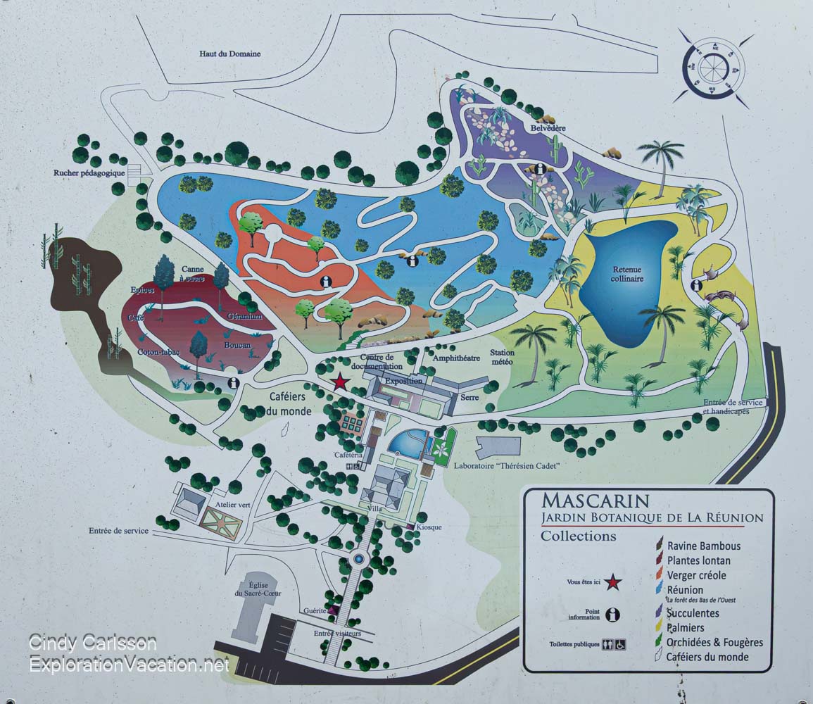 A sign showing all the different garden areas at the Mascarin National Botanical Conservatory.